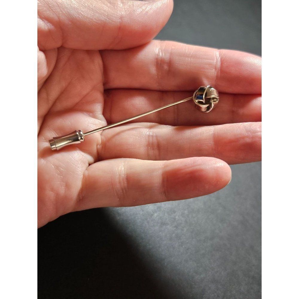 Napier silver tone knotted stick pin